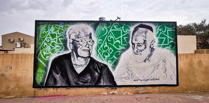 Portraits on an outdoor wall