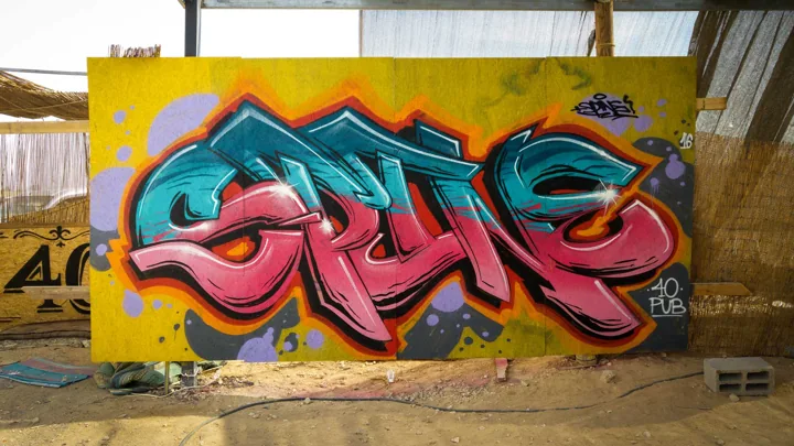 Orange and turquoise lettering
