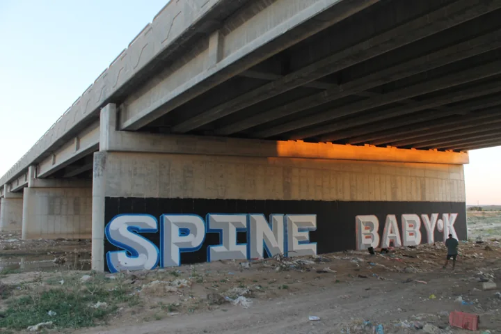 SPINE & Baby K · under the bridge
