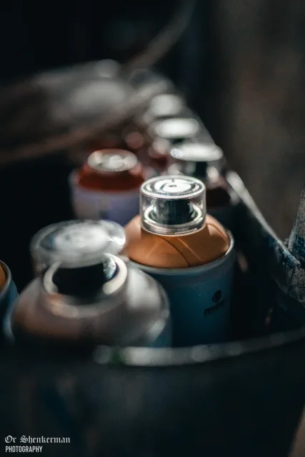 Spray paint nozzles