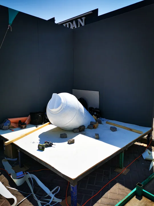 Building the spray-can installation and its raised floor.